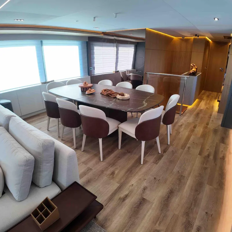 Slide: The Image of Luxurious dining area on 2027 Inace AVENTURA 106 yacht with elegant decor and modern furnishings. - 9