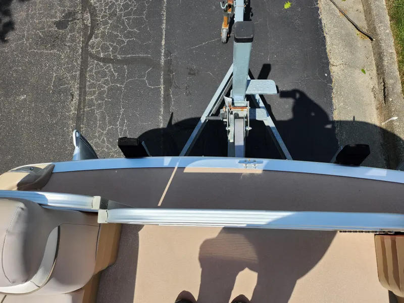 Slide: The Image of Overhead view of a 2012 Bennington 22 SSL boat on a trailer. - 27