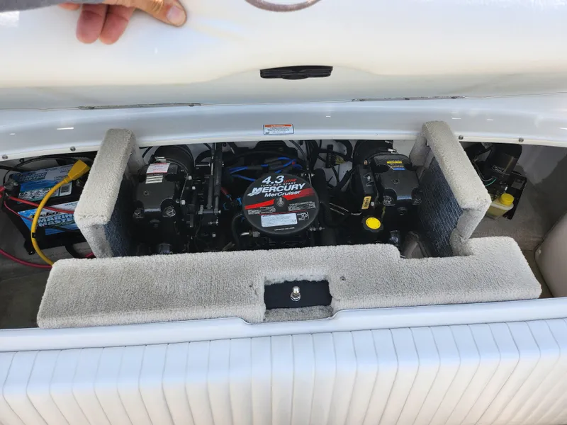 Slide: The Image of Engine compartment of a 2008 Crownline 180 BR boat with Mercury 4.3 engine. - 25