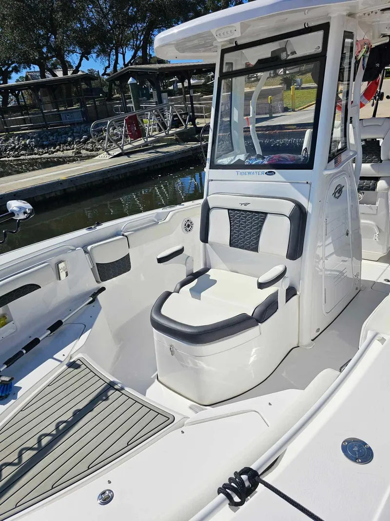 Slide: The Image of 2025 Tidewater 272 CC Adventure boat with sleek seating and modern design. - 7