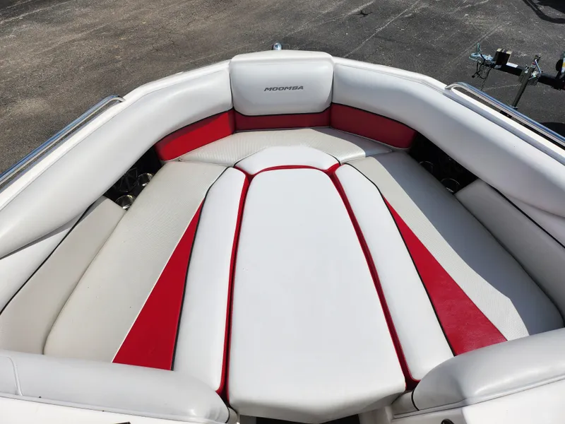 Slide: The Image of 2013 Moomba Mojo 2.5 boat interior with red and white seating. - 20