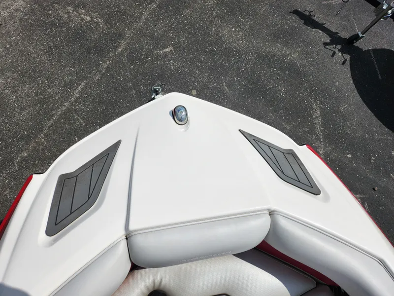 Slide: The Image of 2013 Moomba Mojo 2.5 boat bow with white seating and black accents. - 21