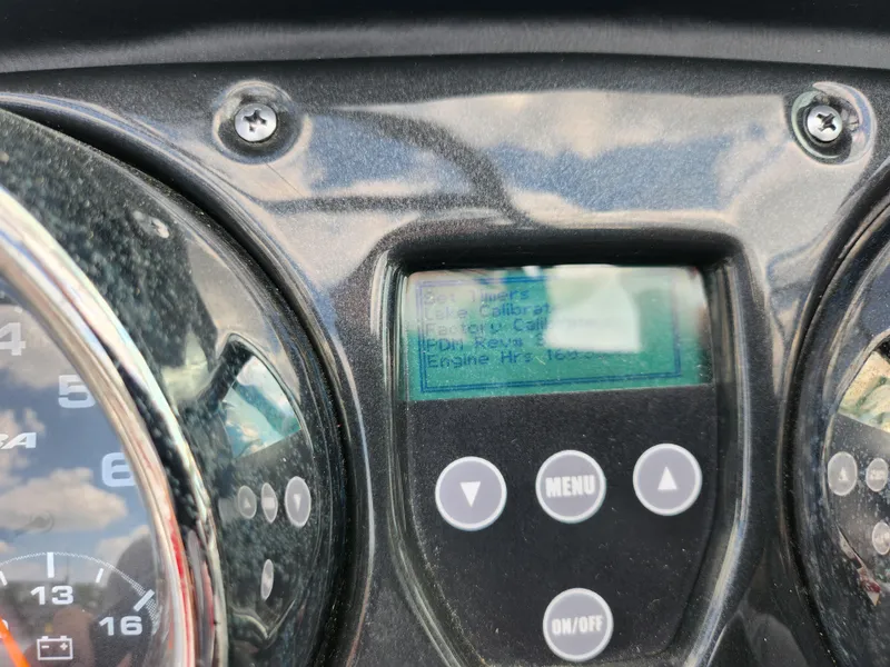 Slide: The Image of Dashboard of a 2013 Moomba Mojo 2.5 boat with digital display and controls. - 31
