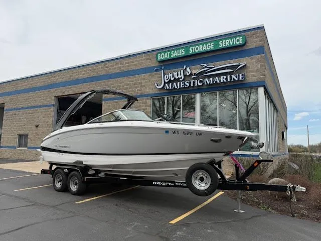 Slide: The Image of 2023 Regal LS6 boat on trailer at Jerry's Majestic Marine dealership. - 0