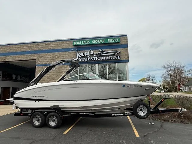 Slide: The Image of 2023 Regal LS6 boat on trailer at Jerry's Majestic Marine dealership. - 1
