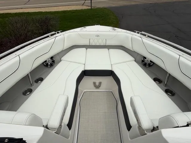 Slide: The Image of 2023 Regal LS6 boat interior with white seating and modern design. - 17