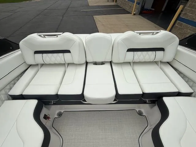 Slide: The Image of Luxurious white seating in a 2023 Regal LS6 boat, showcasing modern design and comfort. - 29