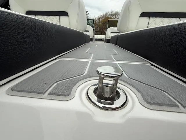 Slide: The Image of 2023 Regal LS6 boat interior with sleek seating and modern design elements. - 37