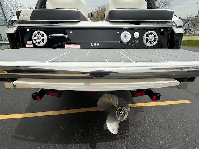 Slide: The Image of 2023 Regal LS6 boat rear view with propeller and speakers. - 4