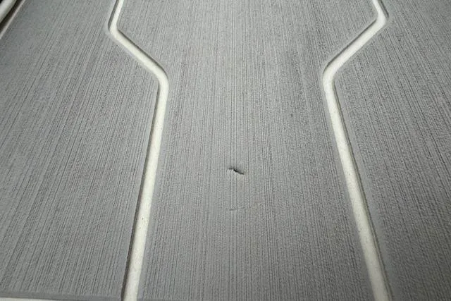 Slide: The Image of Close-up of 2023 Regal LS6 textured surface with a small indentation. - 40