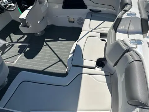 Slide: The Image of 2024 Yamaha Boats SX190 interior with gray seating and modern design. - 2