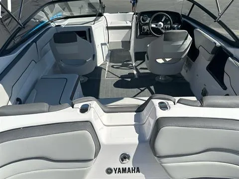 Slide: The Image of 2024 Yamaha Boats SX190 interior with seating and steering console. - 4