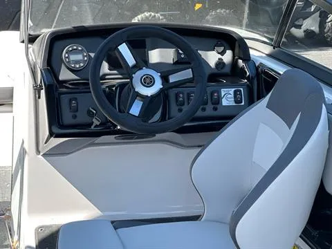 Slide: The Image of 2024 Yamaha Boats SX190 cockpit with steering wheel and control panel. - 5