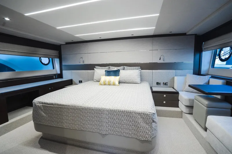 Slide: The Image of Luxurious bedroom interior of 2020 Sunseeker 74 Predator yacht with modern design and elegant furnishings. - 19