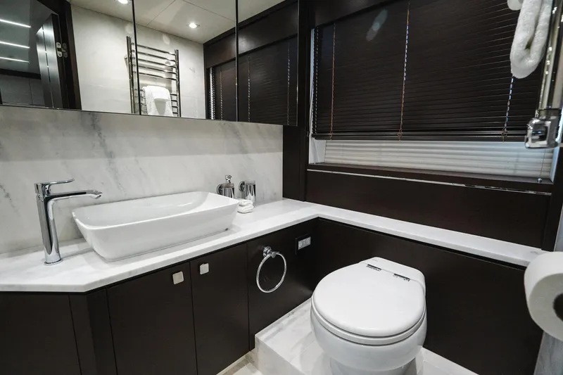 Slide: The Image of Luxurious bathroom in 2020 Sunseeker 74 Predator yacht with modern fixtures and elegant design. - 23