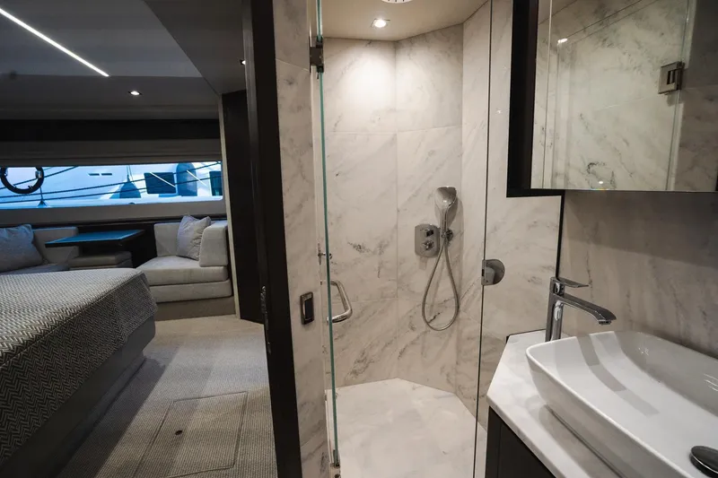 Slide: The Image of Luxurious bathroom and bedroom interior of 2020 Sunseeker 74 Predator yacht. - 24
