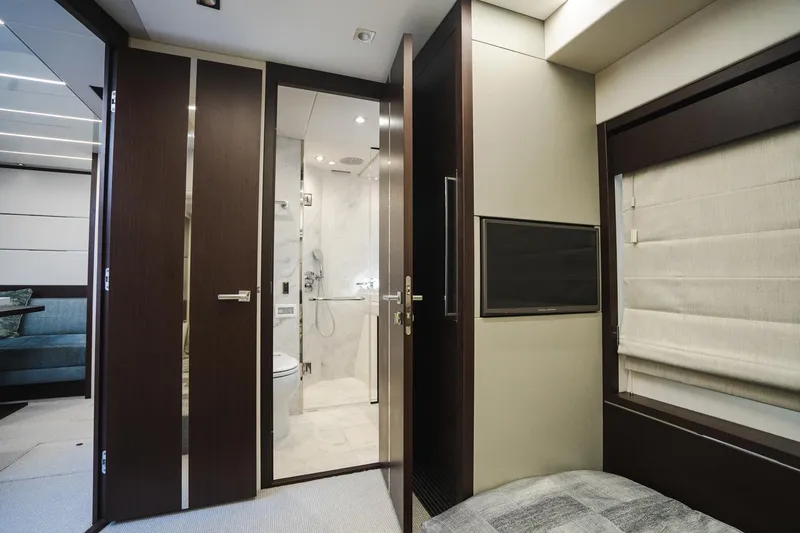 Slide: The Image of Luxurious interior of 2020 Sunseeker 74 Predator yacht with modern bathroom and bedroom. - 28