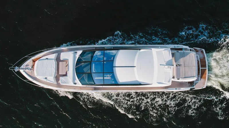 Slide: The Image of Aerial view of 2020 Sunseeker 74 Predator yacht cruising on the water. - 3