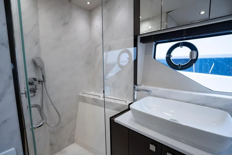 Slide: The Image of Luxurious bathroom in 2020 Sunseeker 74 Predator yacht with modern fixtures and ocean view. - 37