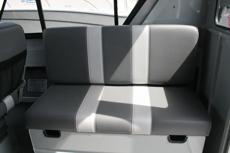 Slide: The Image of 2023 Hewescraft 210 Sea Runner ET HT interior seat, gray and white upholstery. - 8