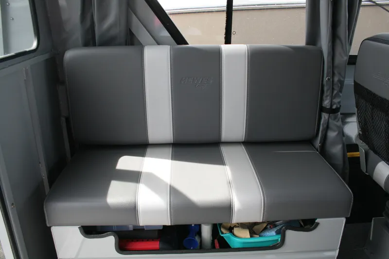 Slide: The Image of 2023 Hewescraft 210 Sea Runner ET HT interior seating with storage underneath. - 9