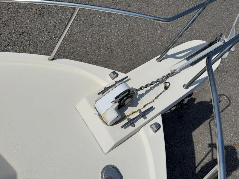 Slide: The Image of Bow of 2004 Parker 2510 Walkaround with anchor chain and winch. - 26