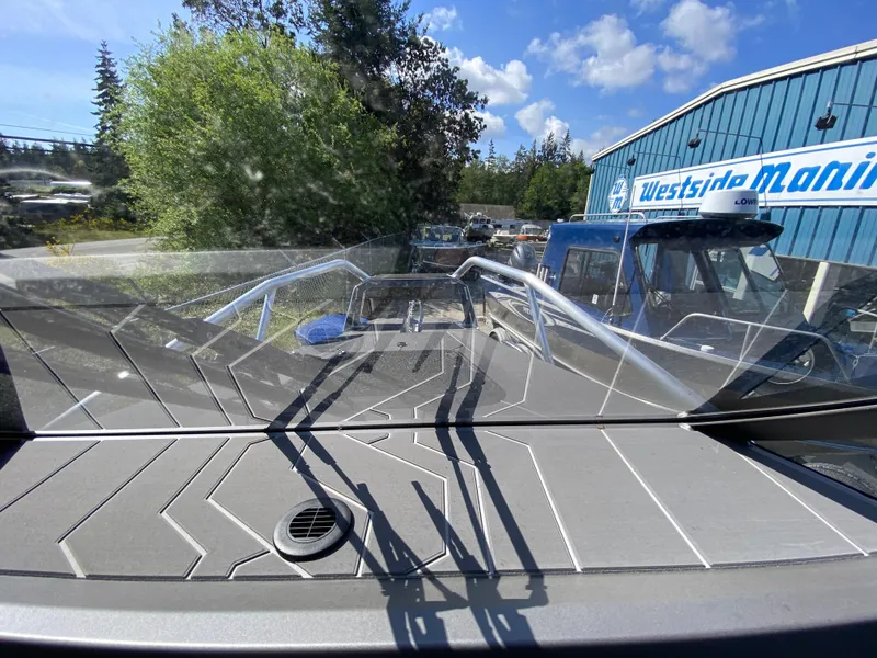 Slide: The Image of 2025 Stabicraft 2350 Supercab at Westside Marina, sunny day, blue sky. - 16