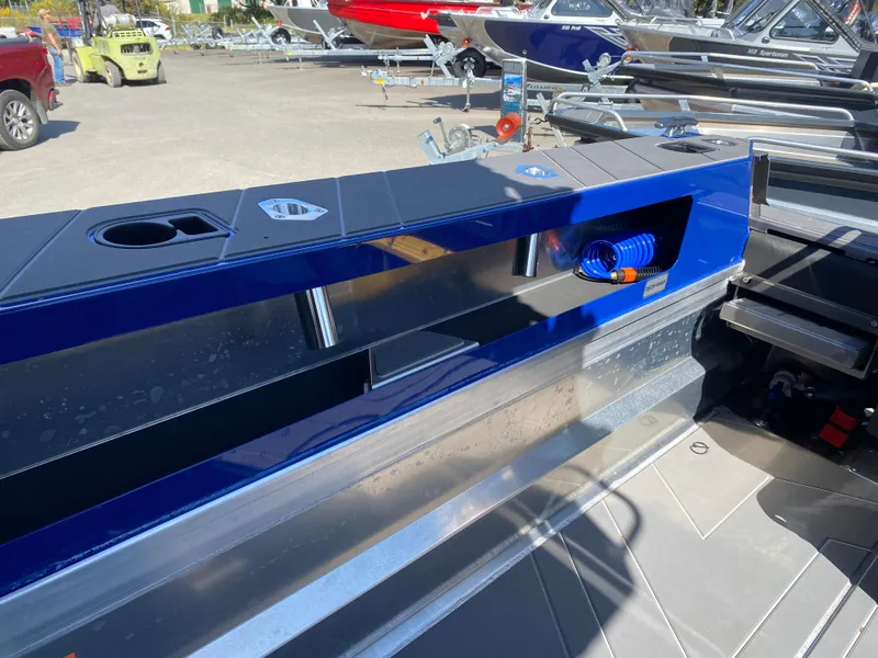 Slide: The Image of 2025 Stabicraft 2350 Supercab interior detail with storage and utility features. - 6