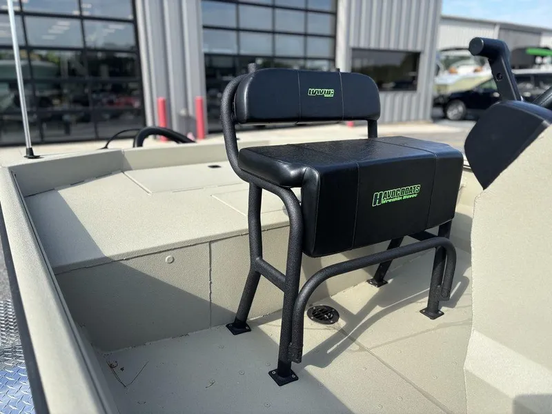 Slide: The Image of Boat seat on 2025 Havoc 1965 UCC, displayed outdoors near a building. - 11