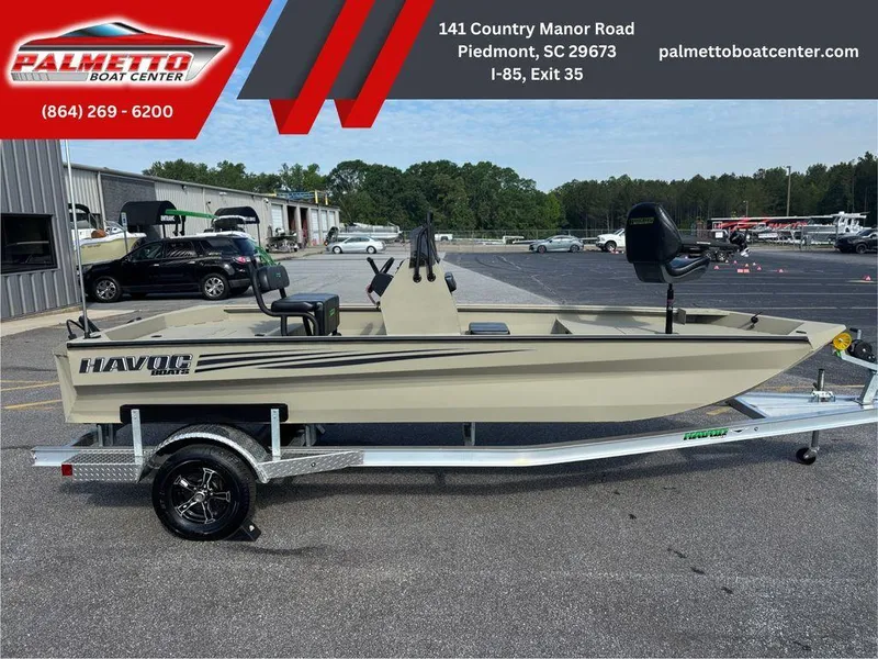 Slide: The Image of Boat dealership showcasing 2025 Havoc 1965 UCC on trailer at Palmetto Boat Center. - 3