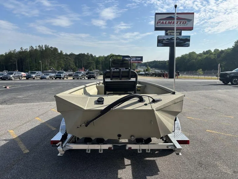 Slide: The Image of Rear view of 2025 Havoc 1965 UCC boat on trailer in parking lot. - 4