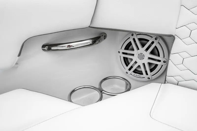 Slide: The Image of 2024 Tiara Yachts 34 LS interior detail with speaker, cup holders, and handle. - 15