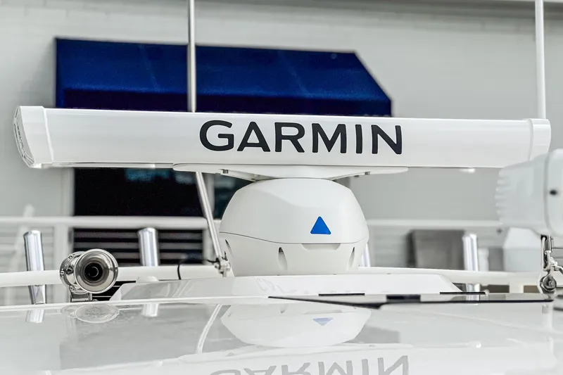 Slide: The Image of 2024 Tiara Yachts 34 LS with Garmin radar system on deck. - 17