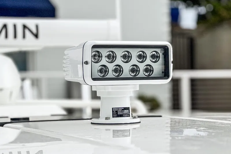 Slide: The Image of 2024 Tiara Yachts 34 LS spotlight with multiple LED lights on a sleek white surface. - 18