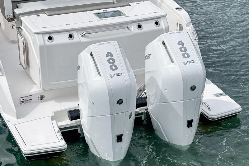 Slide: The Image of 2024 Tiara Yachts 34 LS with dual Mercury 400 V10 outboard engines. - 21