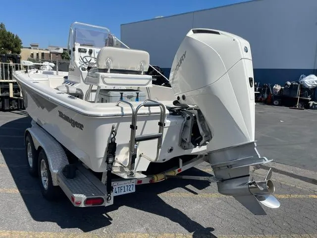 Slide: The Image of 2020 Ranger 2260 Bay boat on trailer with powerful outboard motor. - 4