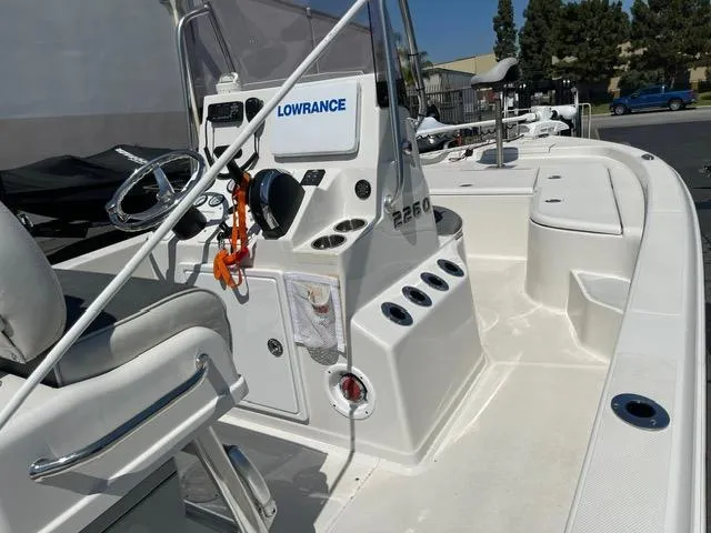 Slide: The Image of 2020 Ranger 2260 Bay boat interior with Lowrance electronics and seating. - 5