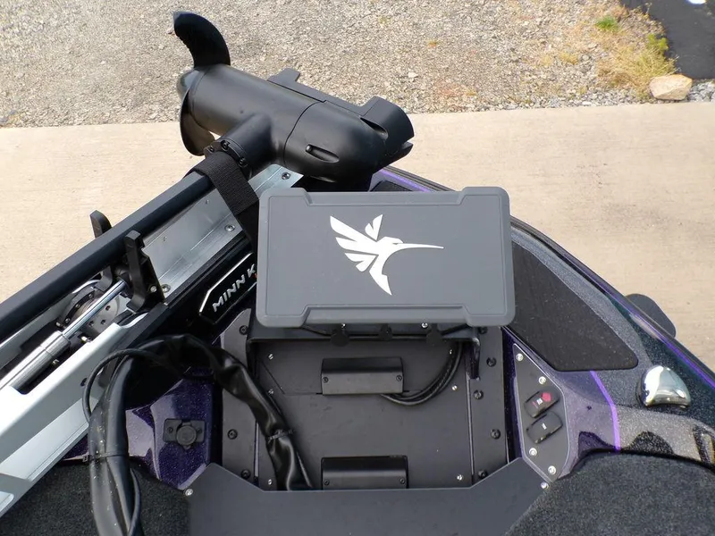 Slide: The Image of 2025 Skeeter ZXR20 boat dashboard with Minn Kota trolling motor and control panel. - 9