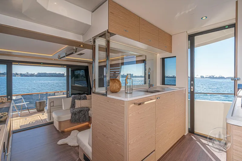Slide: The Image of Modern kitchen interior of 2026 Beneteau Swift Trawler 54 with ocean view. - 15