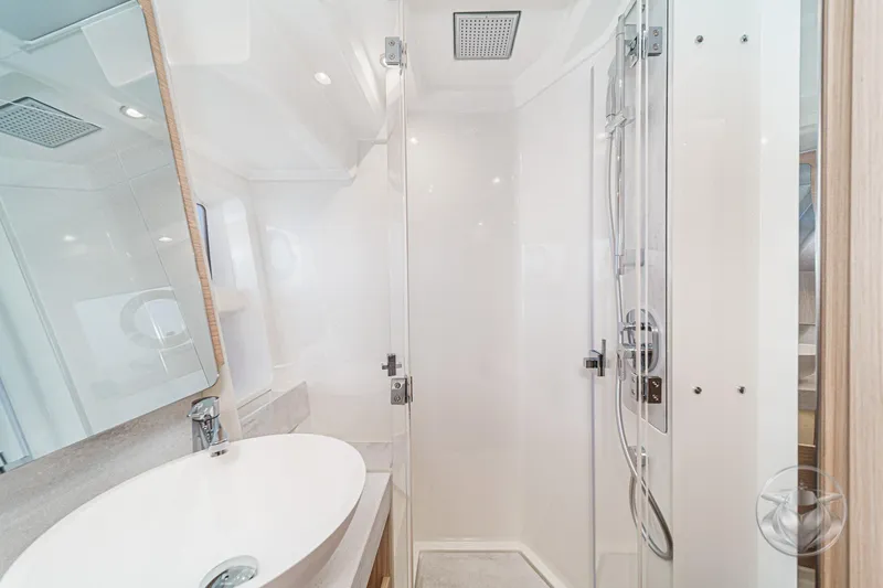 Slide: The Image of Luxurious bedroom interior of 2026 Beneteau Swift Trawler 54 with modern design. - 31