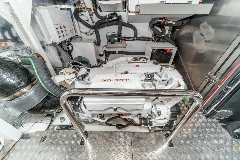 Slide: The Image of Engine room of 2026 Beneteau Swift Trawler 54, showcasing advanced machinery and components. - 51