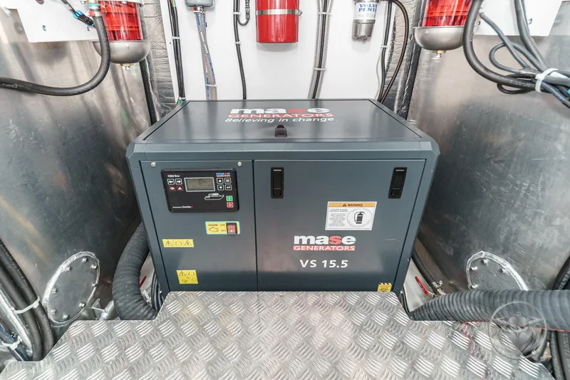 Slide: The Image of 2026 Beneteau Swift Trawler 54 yacht with open storage compartment, showcasing sleek design. - 54