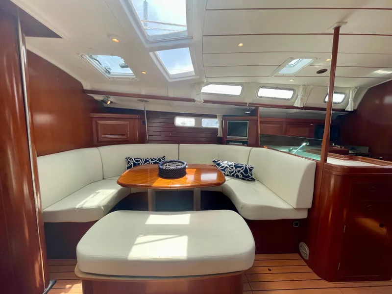 Slide: The Image of Luxurious interior of 2004 Beneteau Oceanis Clipper 473 yacht with elegant seating and skylights. - 15