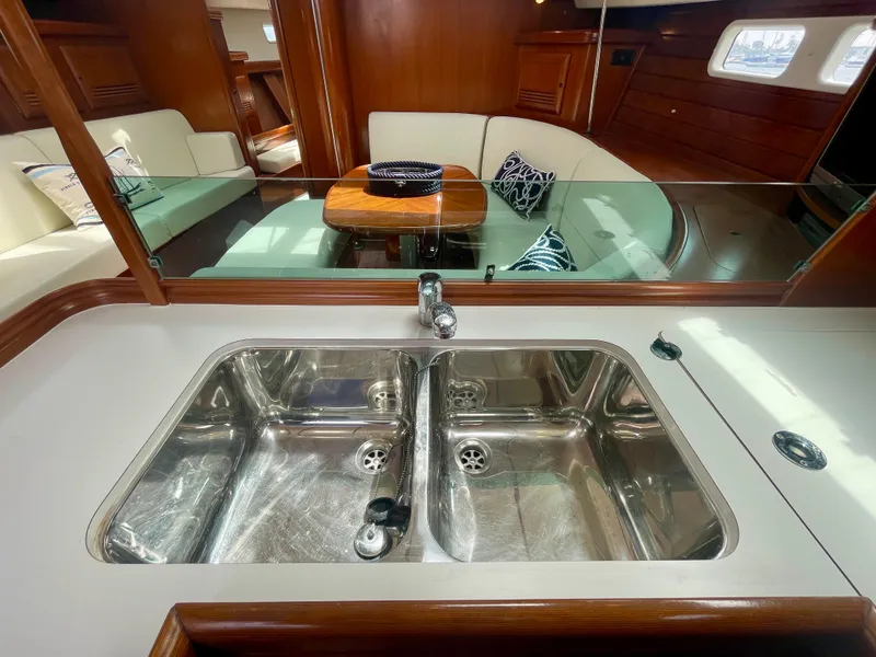 Slide: The Image of Interior of 2004 Beneteau Oceanis Clipper 473 yacht with dual stainless steel sink. - 24