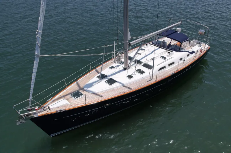 Slide: The Image of 2004 Beneteau Oceanis Clipper 473 sailboat on calm water, aerial view. - 4