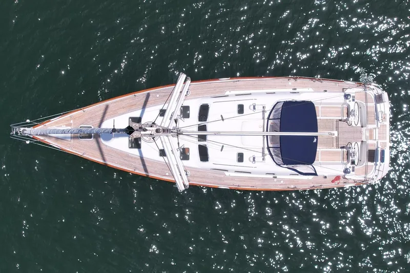 Slide: The Image of Aerial view of 2004 Beneteau Oceanis Clipper 473 sailboat on sparkling water. - 5