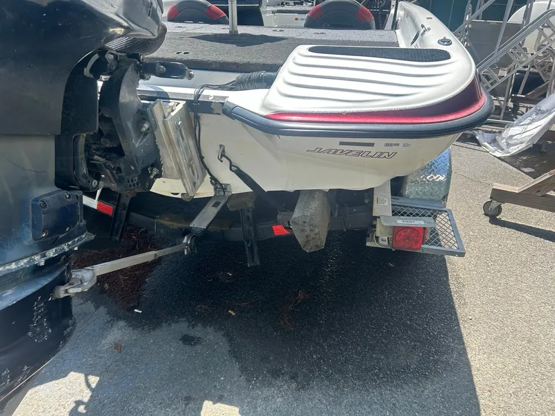 Slide: The Image of 2000 Javelin 20 Renegade boat rear view with motor and trailer. - 8