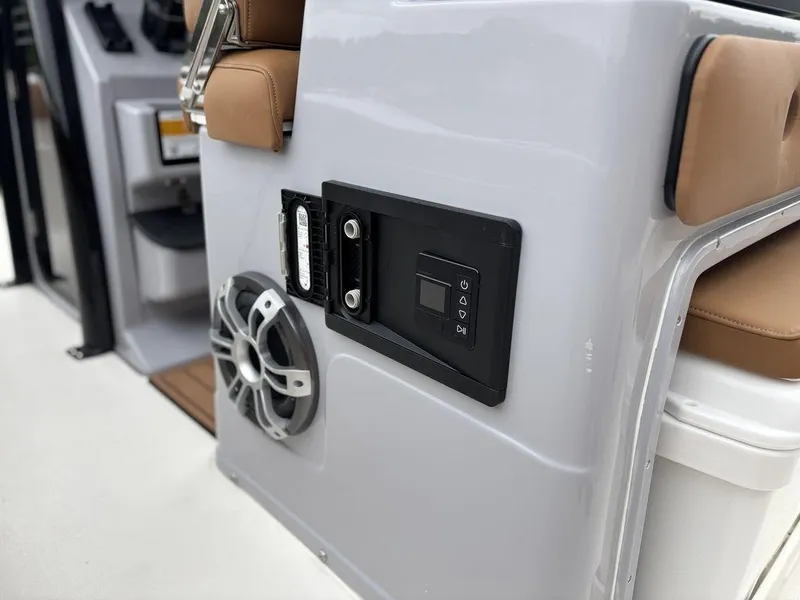 Slide: The Image of 2025 Key West 239FSR boat interior with speaker and control panel. - 10