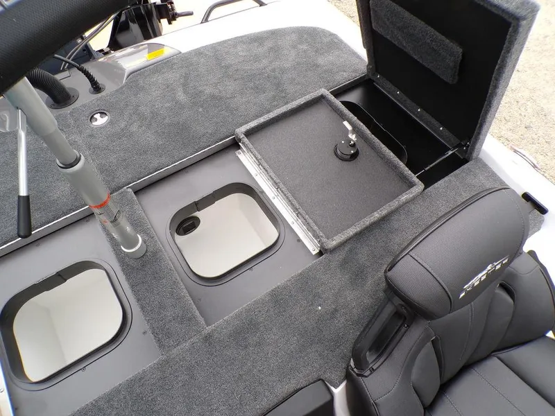 Slide: The Image of 2025 Skeeter ZXR20 boat interior with storage compartments and seating. - 1