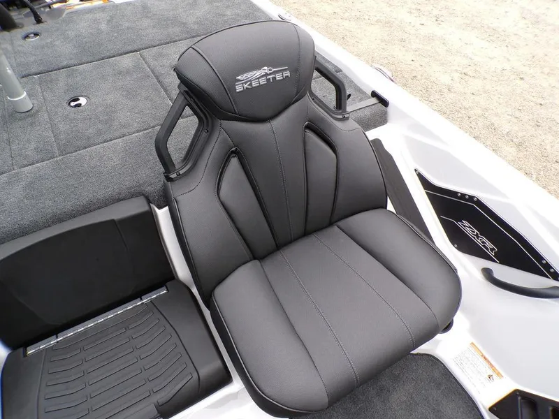 Slide: The Image of 2025 Skeeter ZXR20 boat seat with sleek black design and ergonomic features. - 15